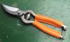 18 cm Garden shears - ORANGE Leather covering branches 2